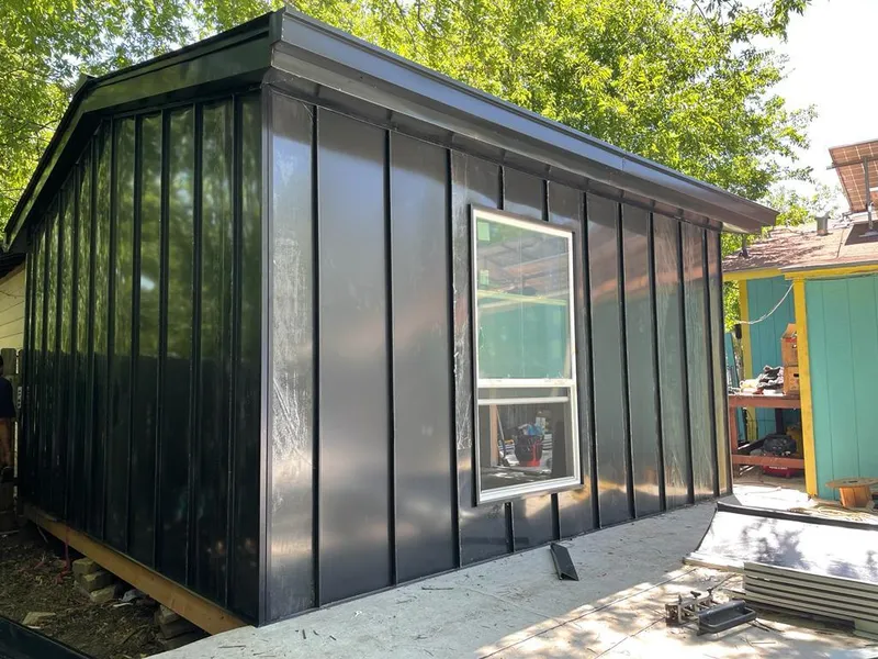 Black standing seam metal wall panels for Roof Inspection in Victor