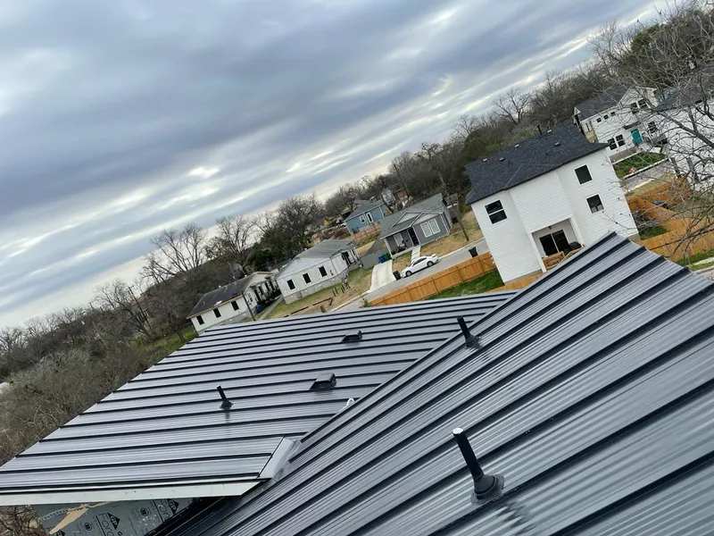 Standing seam metal roof panels with vents for Skylight Repair in Victor